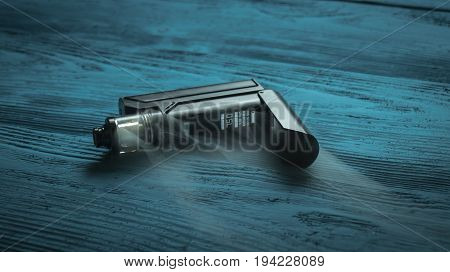 Vaporizer On A Blue Background