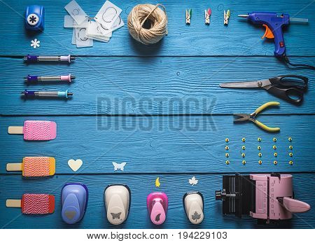 Tools For Scrapbooking On Wooden Boards