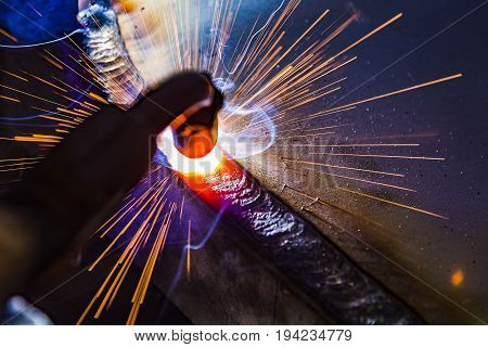 welder craftsman erecting technical steel Industrial steel welder in factory