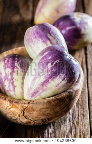 South American fruit sweet cucumber. Pepino dulce or pepino melon on wooden background