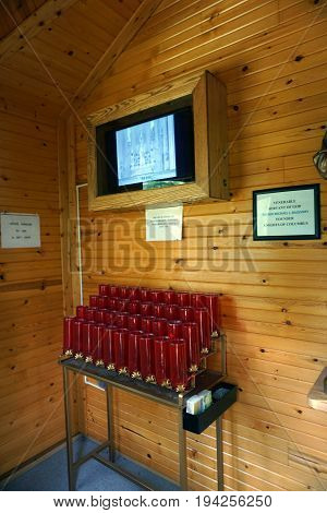 INDIAN RIVER, MICHIGAN / UNITED STATES - JUNE 18, 2017: Visitors to the Cross in the Woods Roman Catholic National Shrine may watch a video about the life and times of Father Michael McGivney, who founded the Knights of Columbus.