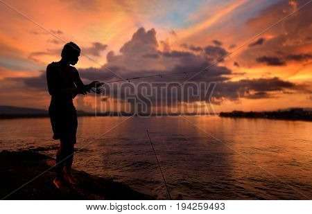Silhouette  Of Freedom Fishing Man