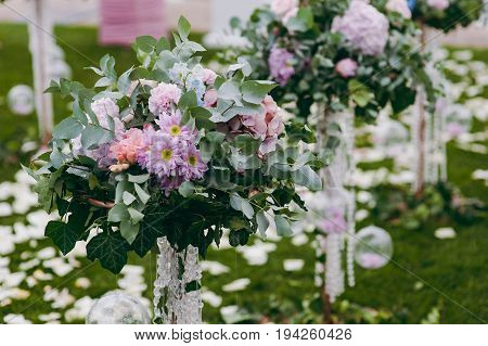 the wedding flower decoration. Green, pink, ornaments