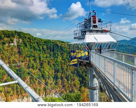 SOCHI, RUSSIA, SEP, 05, 2015: SKYPARK MegaTroll tower start point. 700 m of high speed free fall sliding for people tourists for fun. Sochi sightseeing holiday vacation best tours travel sightseeing