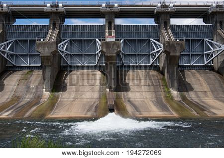 A dam along a lake in Beavers Bend State Park