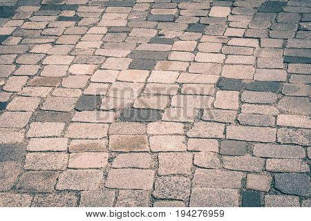 old stone pavement - cobblestone background -