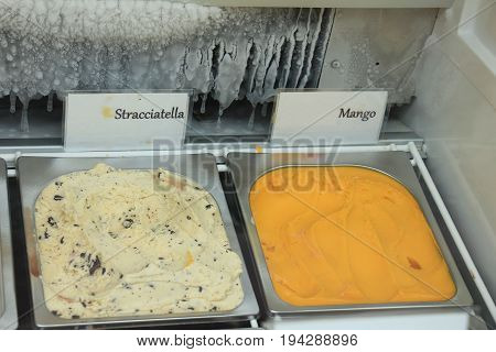 Assorted ice cream flavours on display in a shop