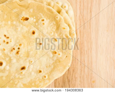 Flat Bread On A Wooden Background