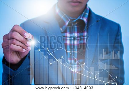 Businessman hand working with new modern computer and business strategy.