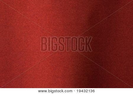Rot fühlte Textur mit leichten Kurve, die auf flachen Gebiet konzentriert.