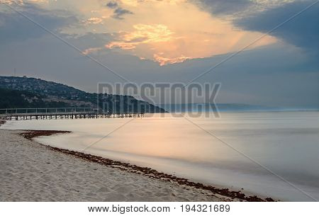 The Black Sea Shore From Albena, Bulgaria With Golden Sands, Sun, Blue Mystic Water, Seaside Bridge