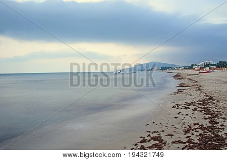 The Black Sea Shore From Albena, Bulgaria With Golden Sands, Sun, Blue Mystic Water, Seaside Bridge