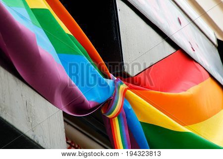 Rainbow flags to celebrate gay pride day in Madrid decorating facades and balconies in the city