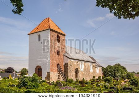 Roman church and graveyard in Vinderslev famous for its wall-paintings Denmark June 22 2017