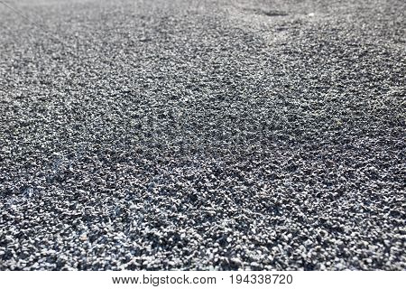 Asphalt from a carpark. This is completely newly laid and not yet driven on.