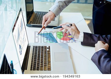 The Above View Of Business Man Discussing Data At Meeting