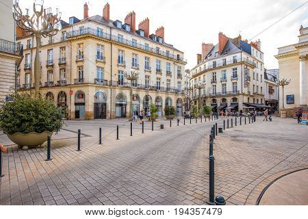NANTES, FRANCE - May 27, 2017: View on the crowded with tourists Graslin square with beautiful buildings in Nantes city in France
