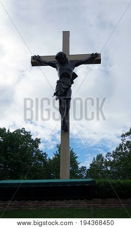 INDIAN RIVER, MICHIGAN / UNITED STATES - JUNE 18, 2017: The Cross in the Woods Roman Catholic National Shrine features the world's largest crucifix.