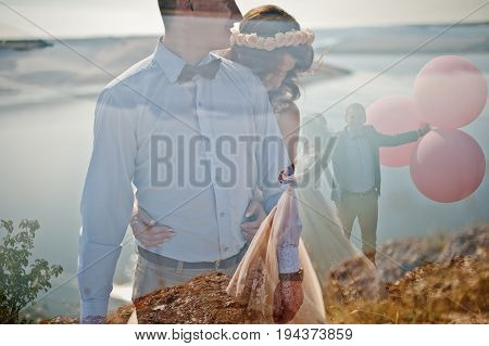 Lomographic Photo Of The Wedding Couple Hugging.