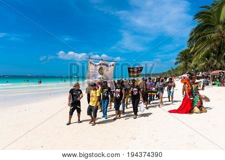 BORACAY, WESTERN VISAYAS, PHILIPPINES - JANUARY 11, 2015: At the Ati-Atihan Festival christians celebrates at White Beach