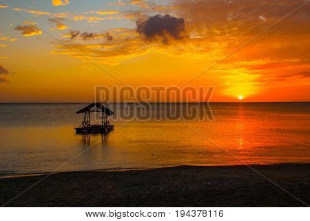 Beautiful Sunset On The Beach. The Silhouette Of The Gazebo. Pandan, Panay, Philippines.
