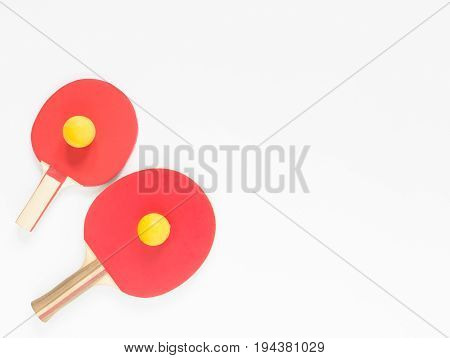 Sport background. Red ping-pong rackets and balls. Flat lay top view