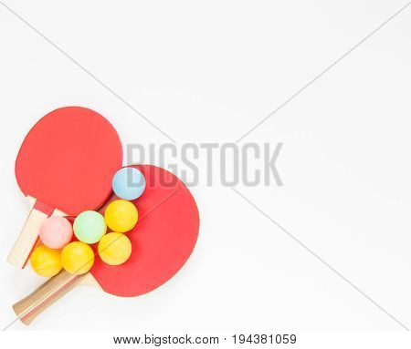 Sport background. Red ping-pong rackets and balls. Flat lay top view
