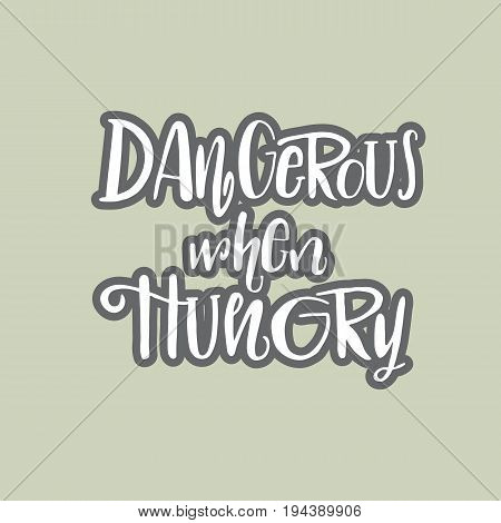 Dangerous When Hungry Hand Drawing Lettering Illustration. Good Phrase For T-shirt, Postcard.