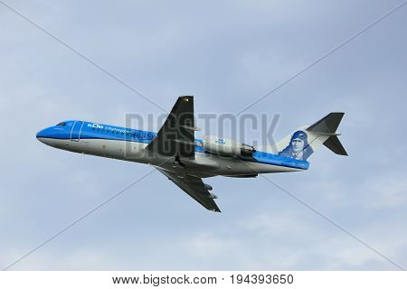 Amsterdam the Netherlands - July 6th 2017: PH-KZU KLM Cityhopper Fokker F70 takeoff from Polderbaan runway Amsterdam painted in 