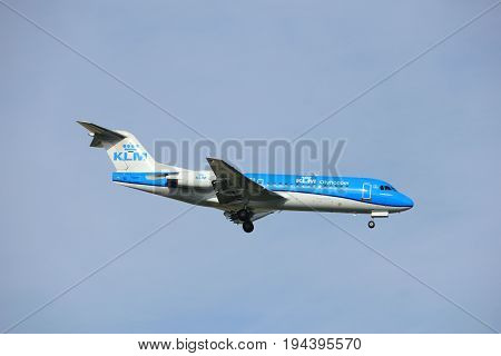 Amsterdam the Netherlands - July 7th 2017:PH-KZB KLM Cityhopper Fokker F70 approaching Schiphol Amsterdam Airport Polderbaan runway