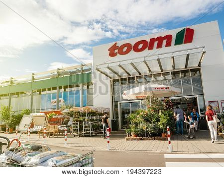 FRANKFURT GERMANY - JUN 30 2017: TOOM Baumarkt entrance - the German DIY-store chain offering home improvement and do-it-yourself goods - customers buying goods selecting the best tools