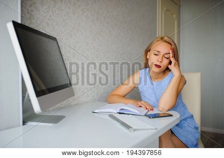 Serious Young Woman In Blue Dress Have Headache