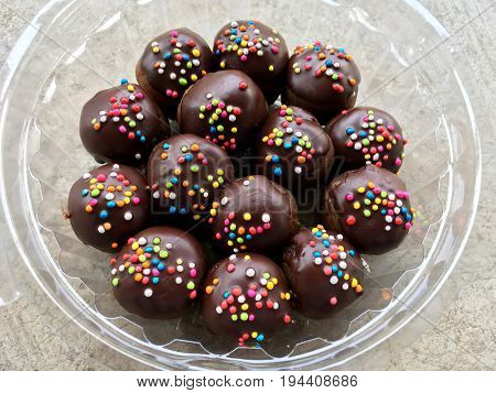 close up sweet chocolate ball on cement floot
