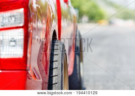 Soft rubber surface after burning tyre of dragster car before race