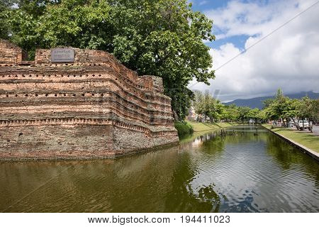 Ancient Chiang Mai moat and ancient wall .
