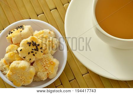 Chinese mini cookies dressing black and white sesame eat with hot tea