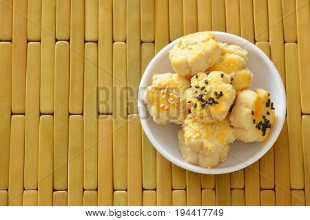 Chinese mini cookies dressing black and white sesame on cup