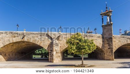 Historic Puente Del Real Bridge In Turia River Park In Valencia