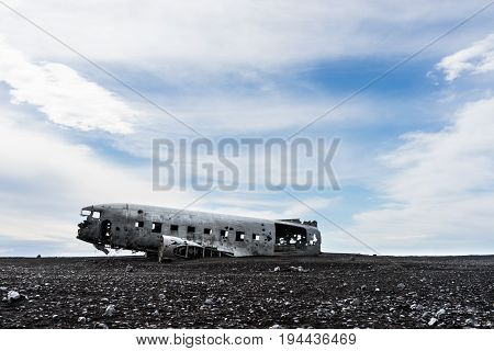 Abandoned plane wreck on the desolate Sólheimasandur black sand beach