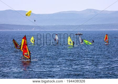 Brac island, Croatia - July 8, 2017: Windsurfing on Adriatic sea, Croatia, Brac island