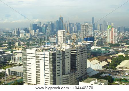 Urban skyline with building construction on progress