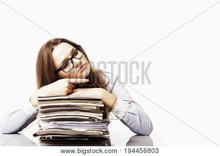 business woman working with documents in the workplace pointing her finger towards copy space area (Success job gestures body language concept)
