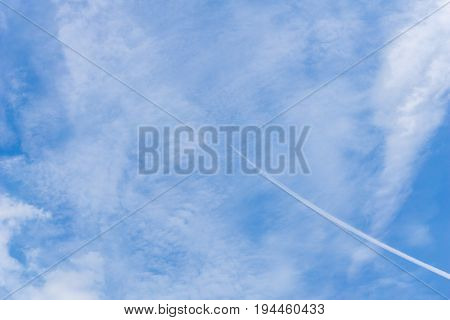 View on beautiful white clouds in a blue sky. Clouds and Skies in the Morning. The Sun behind Clouds. Fresh Air. Cloudy Weather. Cloud Formations. White Clouds