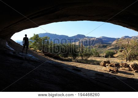 Silhouette Of A Man At Phillip's Cave At Ameib, Erongo Mountains, Namibia