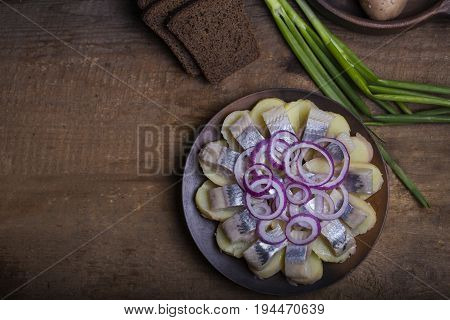 Salted Herring With Potatoes And Onions