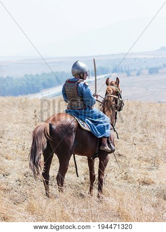 Tiberias Israel July 01 2017 : Participants in the reconstruction of Horns of Hattin battle in 1187 participate in the battle rides on the battlefield near TIberias Israel