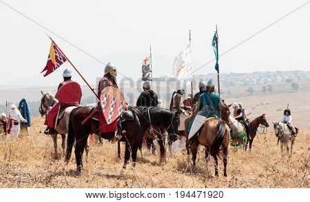Tiberias Israel July 01 2017 : Participants in the reconstruction of Horns of Hattin battle in 1187 moving around the battlefield near Tiberias Israel