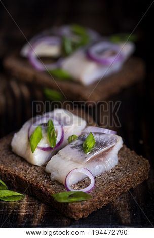 Snack Of Rye Bread, Herring And Onions