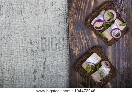 Snack Of Rye Bread, Herring And Onions
