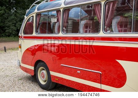 Rouen France - July 1 2017. Old bus collection withe and red first registration in 1959 still drive Setra brand. In a park outdoor ready to go.